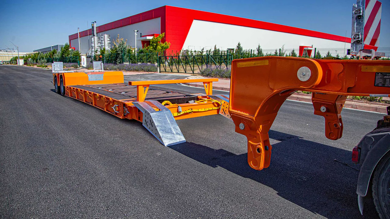 Multi axle low loader setup for machinery transport on demanding routes. — STU Trailers