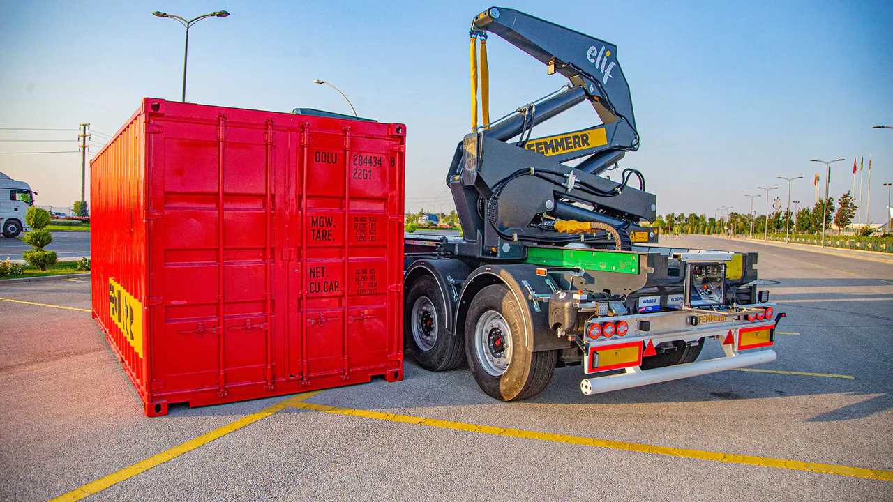 Movimentare container senza gru esterna